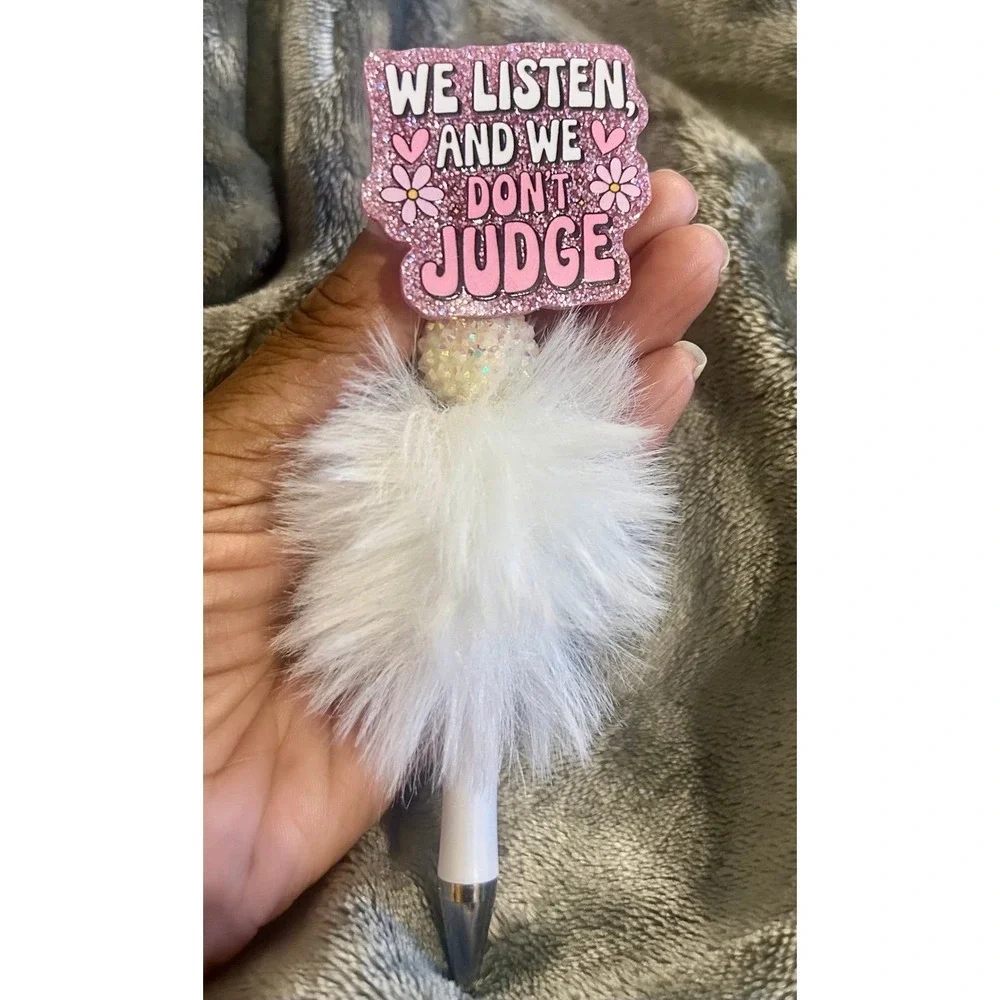 See Pictures!!Spinning fancy funny We Listen & Don't judge black ink pen +refill